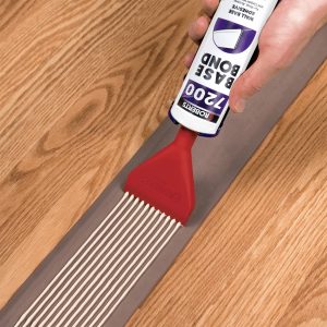 SNOZZLE ADHESIVE APPLICATOR